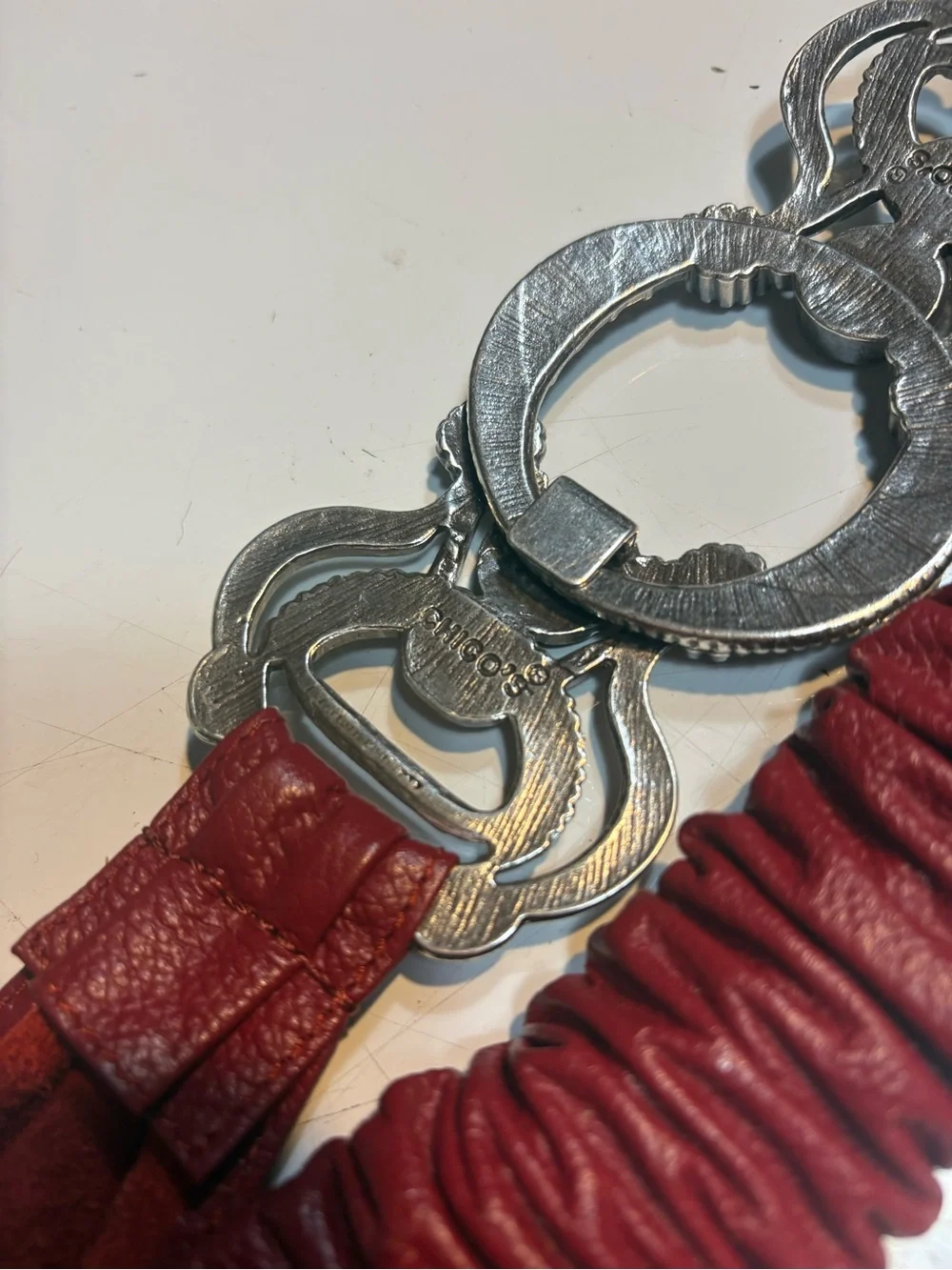 Chico's red leather stretch belt large, ornate silver statement buckle
